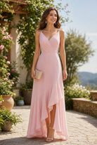Blush pink chiffon prom dress with ruched V-neck bodice and layered high-low skirt
