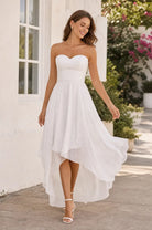 White strapless sweetheart chiffon prom dress with draped high-low skirt