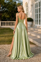 Satin A-line prom dress light green, open-back spaghetti straps, floor-length slit