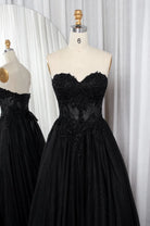 Black strapless lace ball gown with sweetheart neckline and glitter tulle skirt