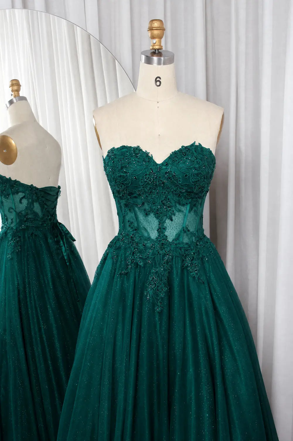 Emerald strapless lace ball gown with sweetheart neckline and tulle skirt