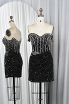 Black sequin mini dress with off-shoulder beaded corset bodice and ruched skirt