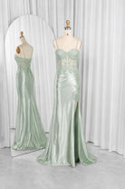 FLORIA sage green corset prom dress on mannequin, spaghetti straps, full-length skirt