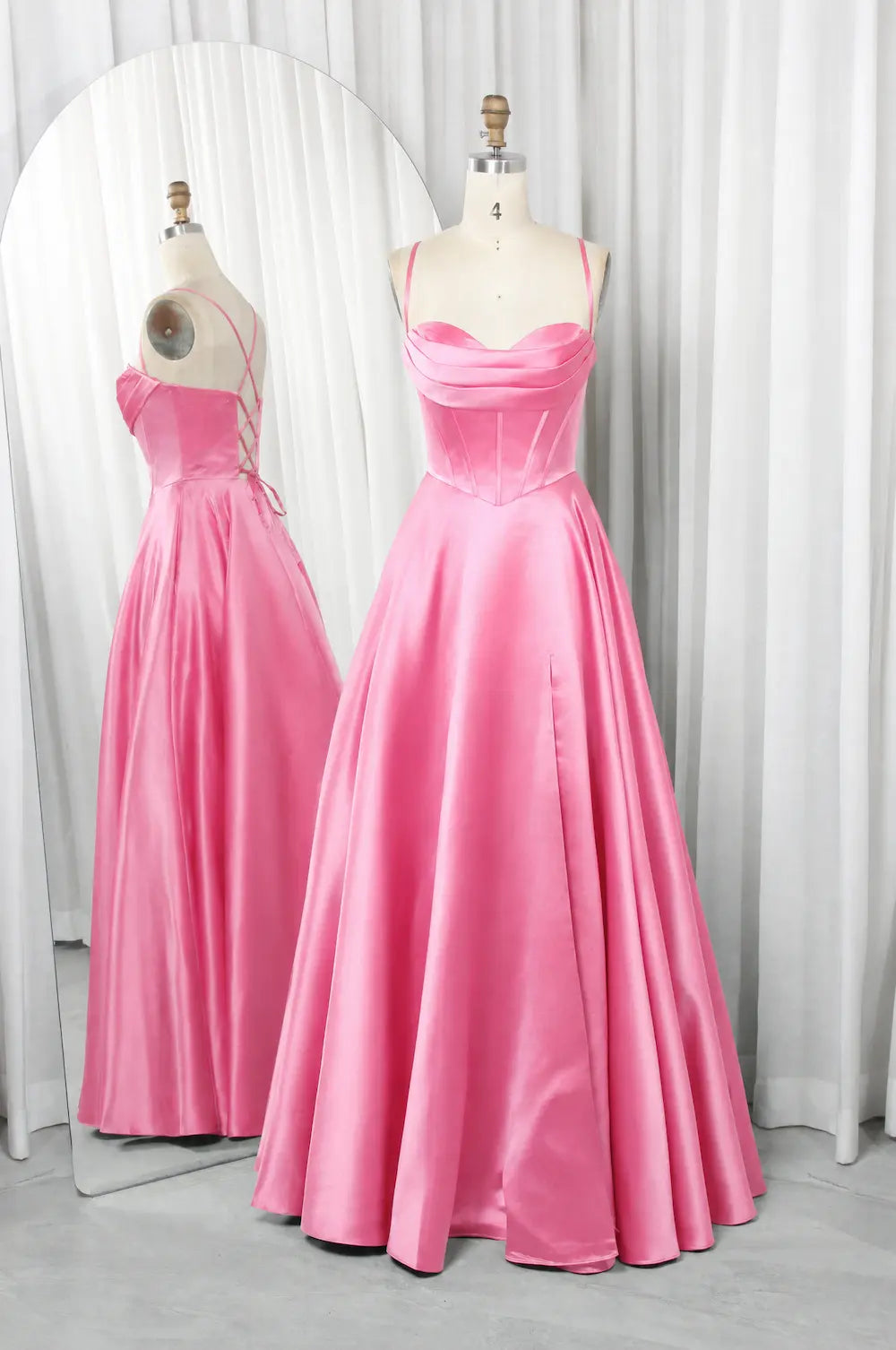 Bright pink A-line prom dress with strapless neckline and pleated full skirt