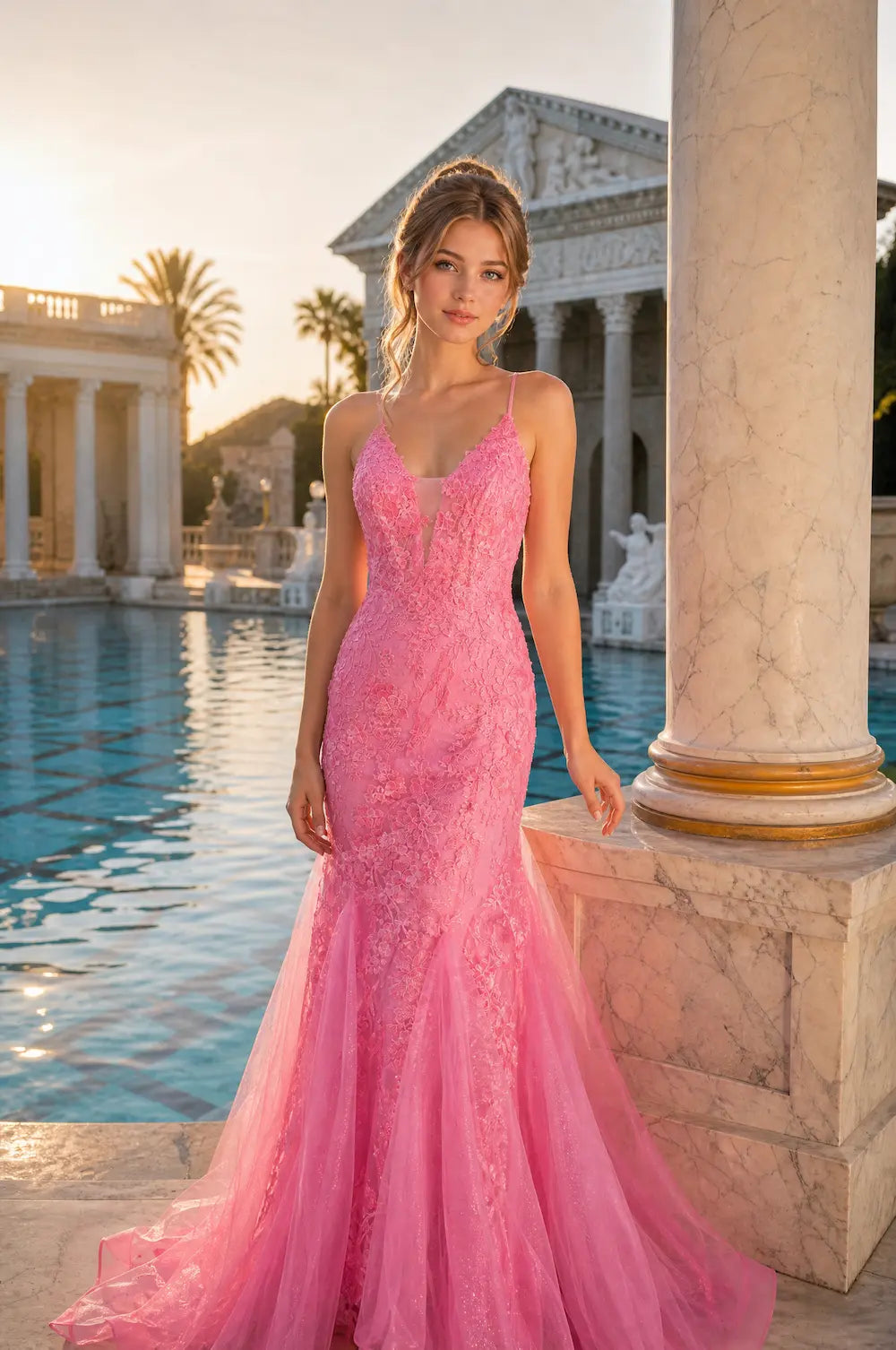 Pink rhinestone lace mermaid prom dress on model with spaghetti straps