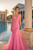 Pink rhinestone lace mermaid prom dress on model with spaghetti straps