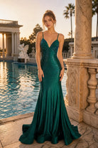 Teal rhinestone V-neck mermaid prom dress with spaghetti straps and flared hem