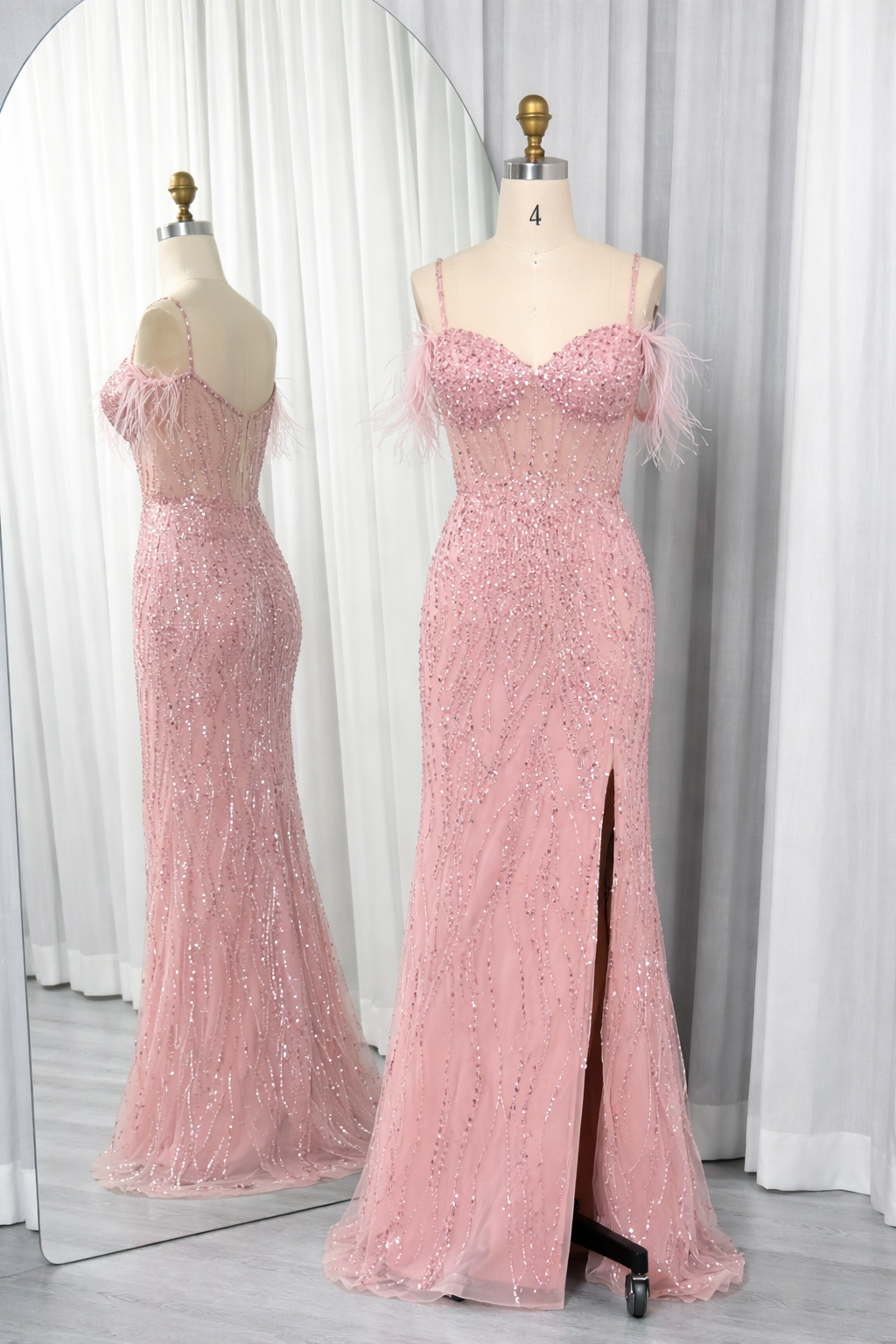 Blush pink sequin prom dress with feather off-shoulder straps and front slit