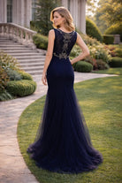 Navy lace appliqué mother of the bride dress with illusion neckline and flowing mermaid skirt