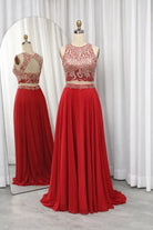 Red chiffon mother-of-the-bride dress with embroidered bodice and full pleated skirt