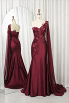 Wine one-shoulder satin gown with 3D floral appliqués and draped sleeves