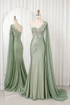 Sage one-shoulder satin gown with 3D floral appliqués and flowing sleeves