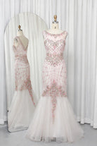 Pink mermaid mother-of-the-bride dress with illusion neckline and floral beaded appliques
