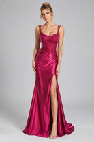 Hot pink satin mermaid prom dress with sequin lace bodice and thigh-high slit