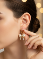 Statement Gold-Tone Bow Pearl Drop Earrings (Model Look) - RM026