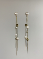 Long Gold-Tone Chain Tassel Earrings with Scattered Pearls - RM023