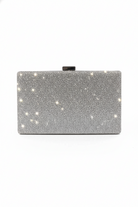 Silver crystal-embellished box clutch with top clasp, rectangular silhouette.