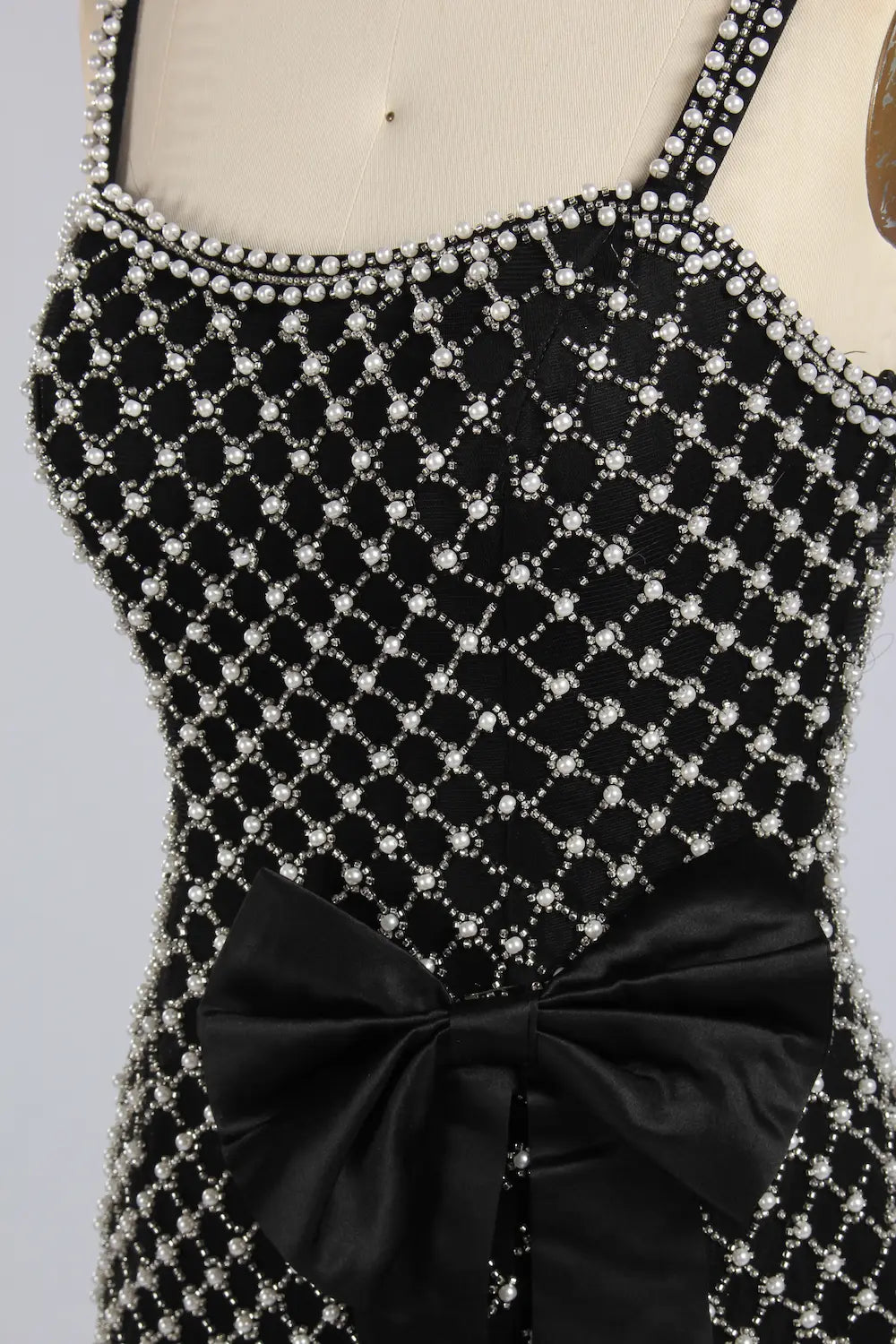 Plus size beaded evening dress, black rhinestone lattice with bow waist detail