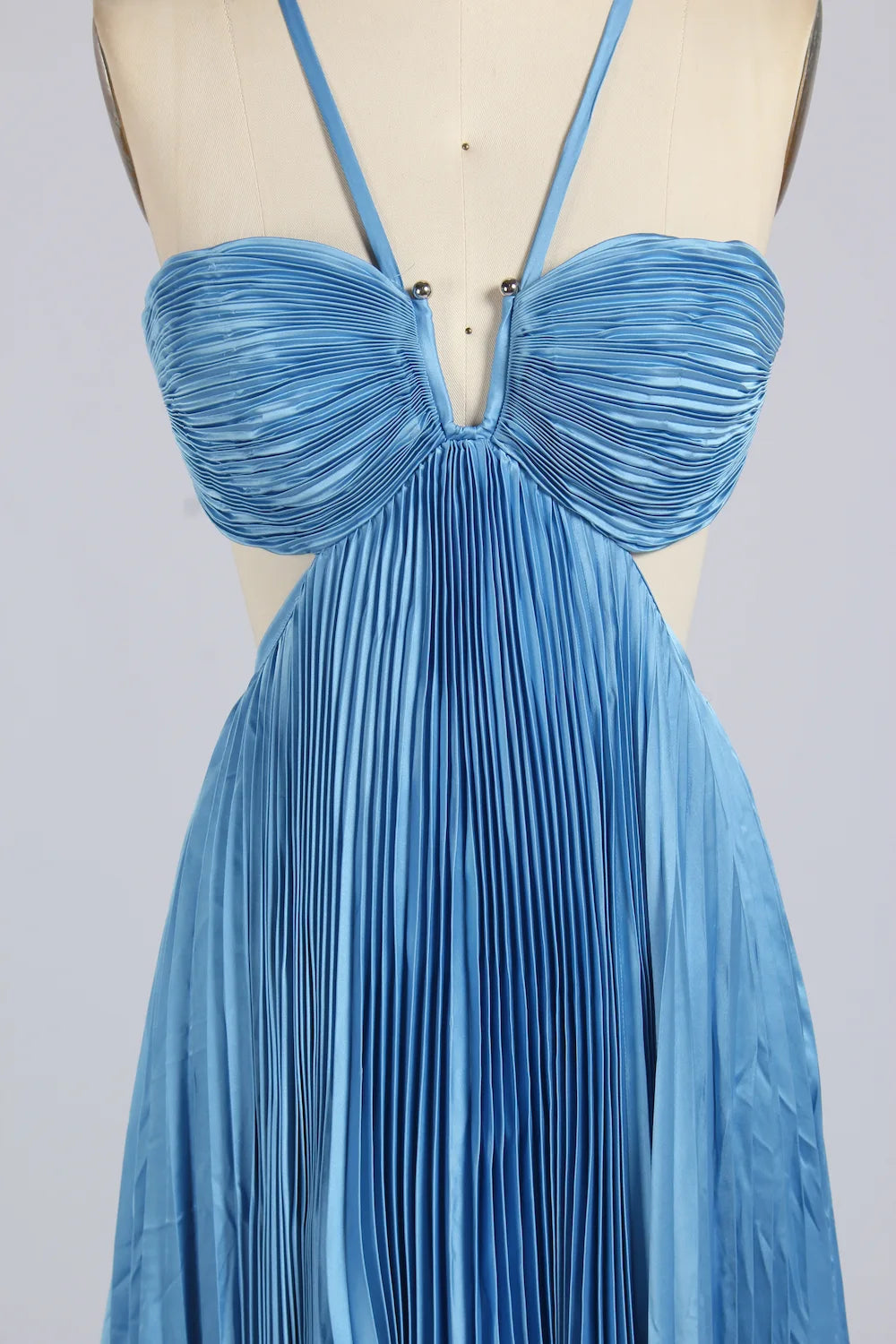 Blue plus-size maxi dress close-up: ruched sweetheart cups and center keyhole