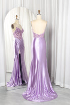 Lilac satin mermaid gown with beaded corset straps and front slit, mannequin view