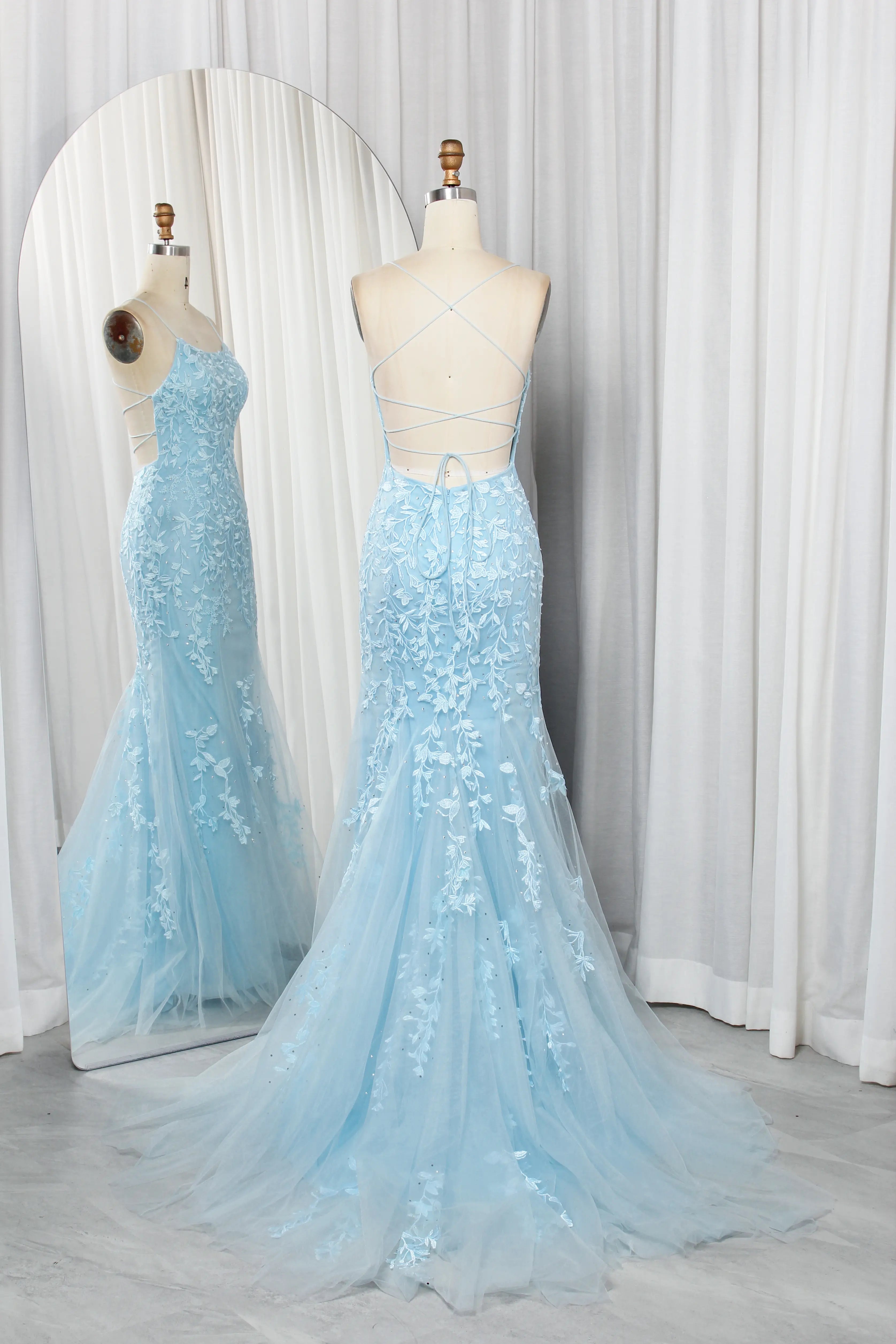 Sky blue floral lace tulle mermaid prom gown on mannequins, spaghetti straps