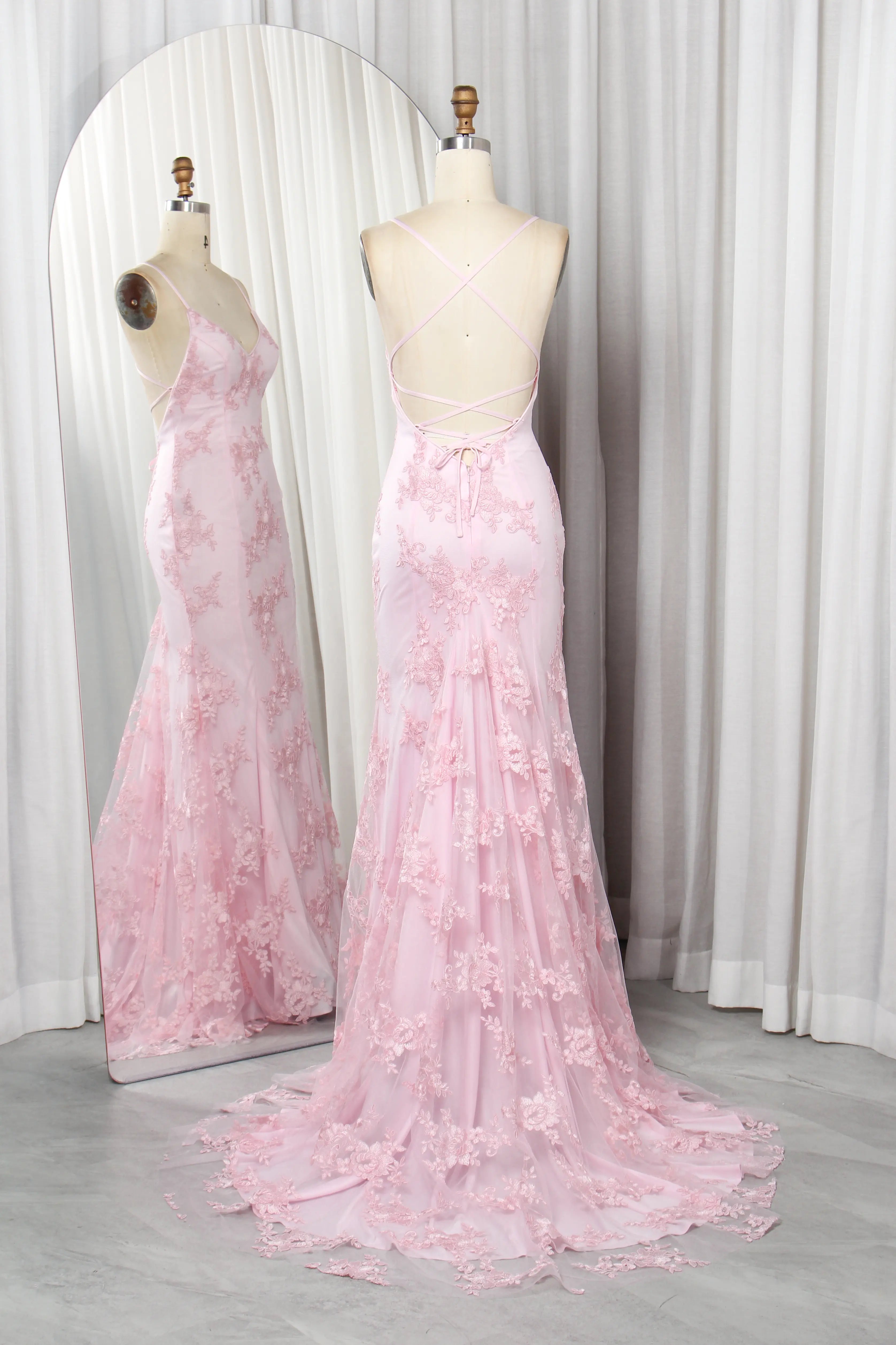 Light pink lace applique mermaid prom gown with V-neck and adjustable tie-back spaghetti straps