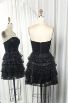 Black strapless sweetheart tiered tulle dress with layered ruffles and sequin trim