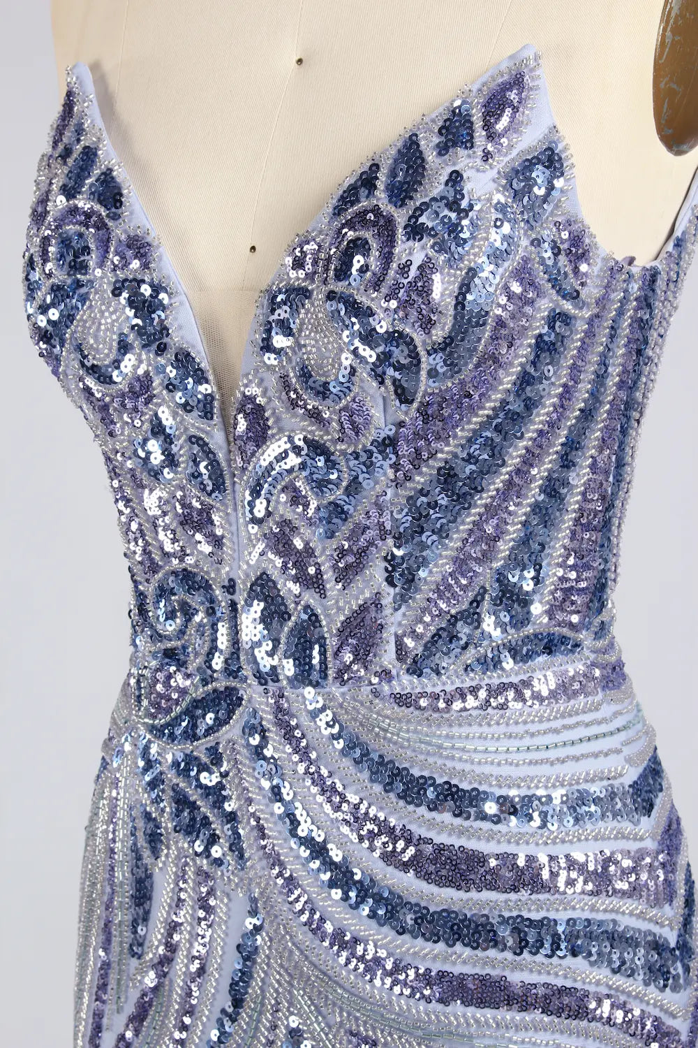 Blue sequin bodice with ornate swirl embellishments