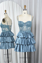 Dusty blue sequin lace corset babydoll dress with tiered satin ruffles and lace bodice