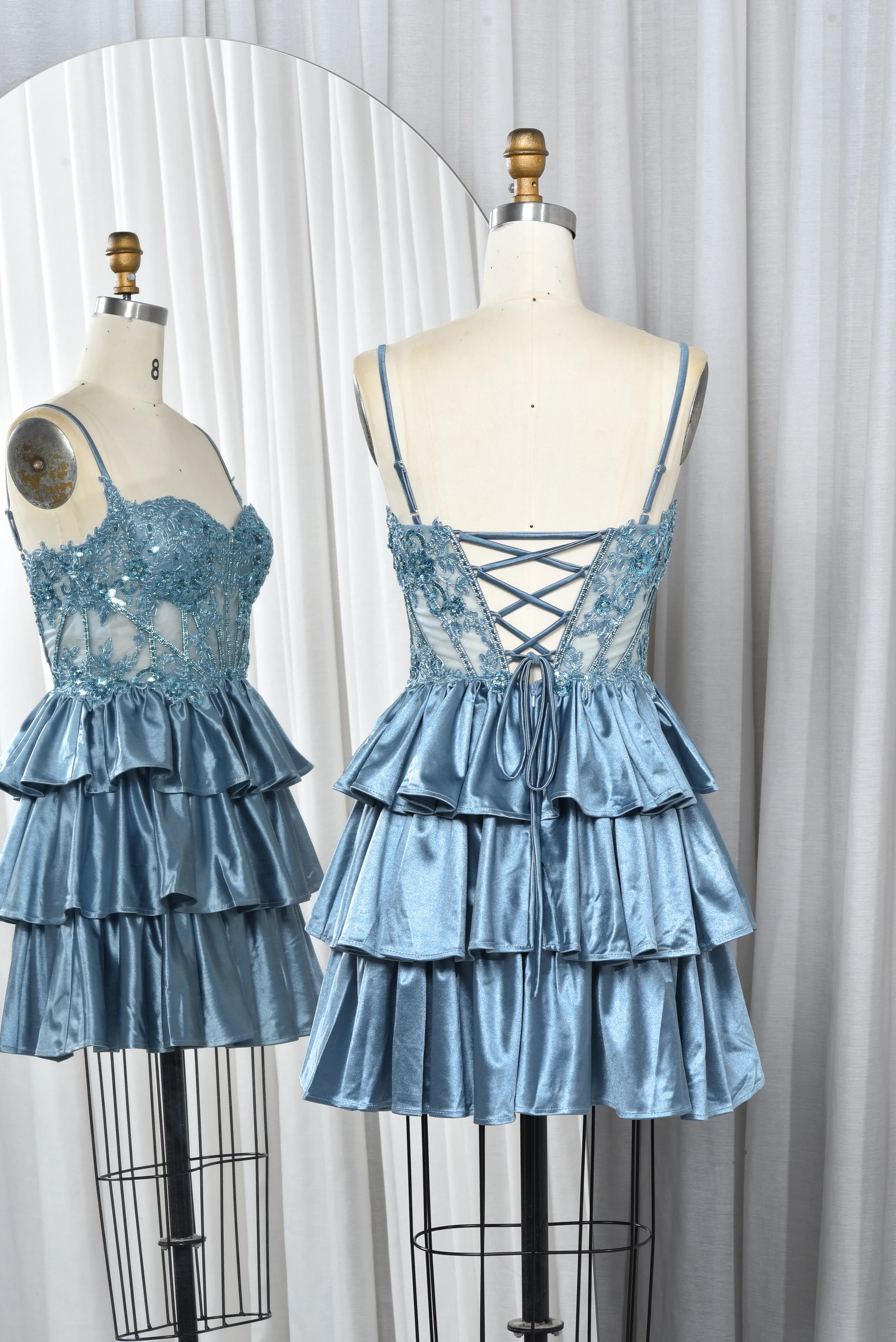 Dusty blue sequin lace corset babydoll dress with crisscross back straps and tiered ruffles