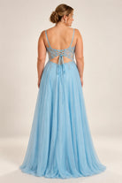 Sky blue plus-size formal gown with open-back tie straps and flowing tulle skirt