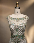 Beaded mermaid dress bodice with sweetheart neckline, teal-and-silver beadwork detail