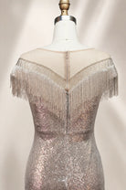 Silver sequin backless gown with fringe off-shoulder sleeves