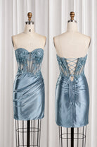 Dusty blue strapless homecoming dress on mannequins, lace corset front and lace-up back