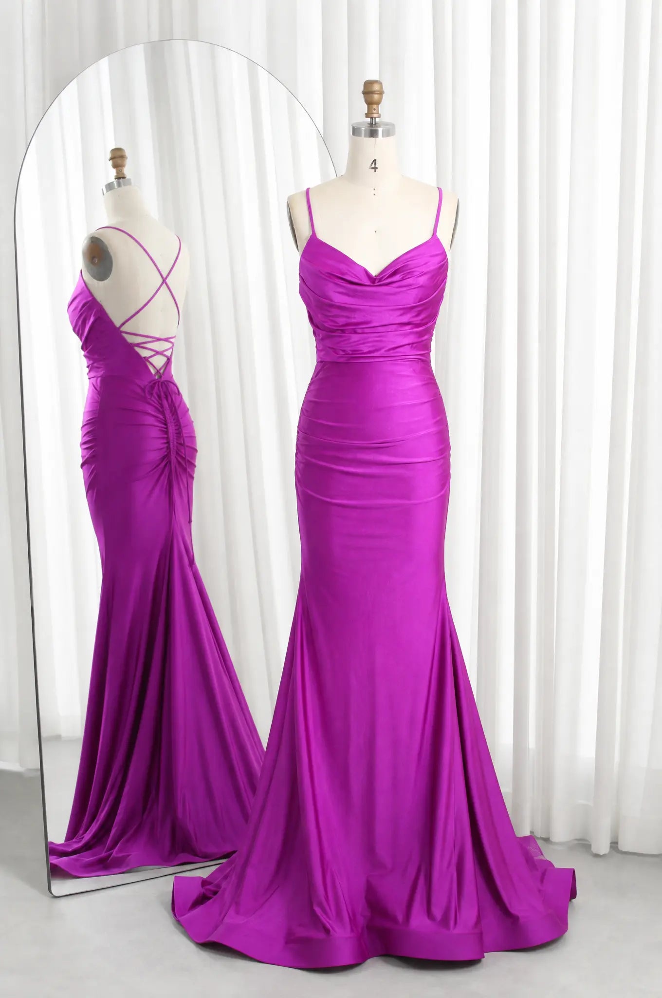 Purple satin cowl-neck ruched mermaid prom dress with spaghetti straps and lace-up back.