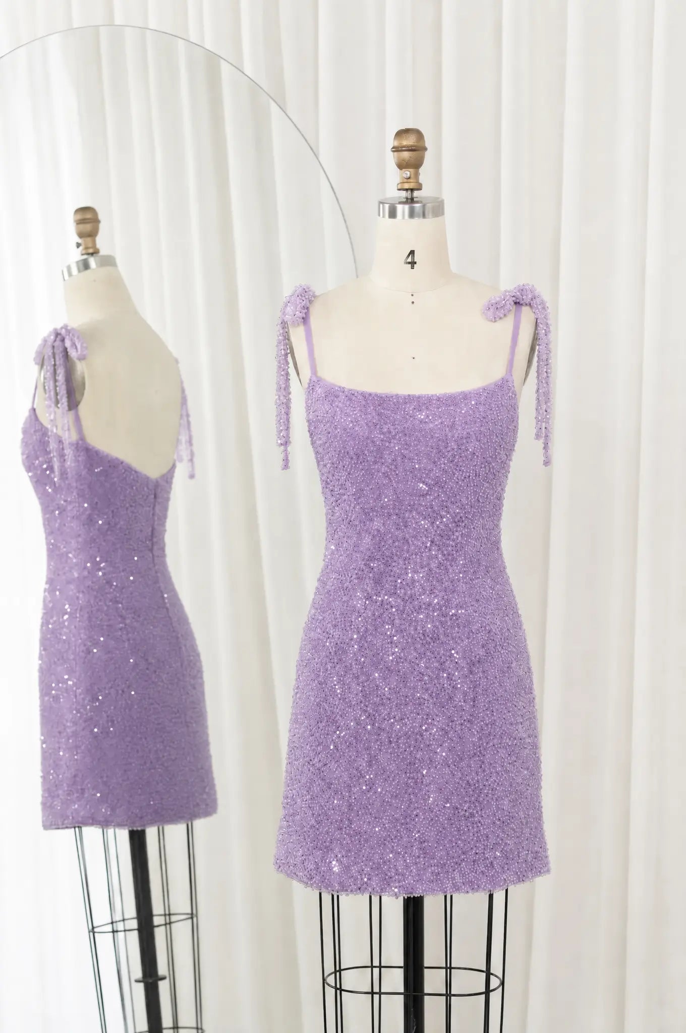 Lilac fully beaded short homecoming dress with spaghetti straps and scoop neckline