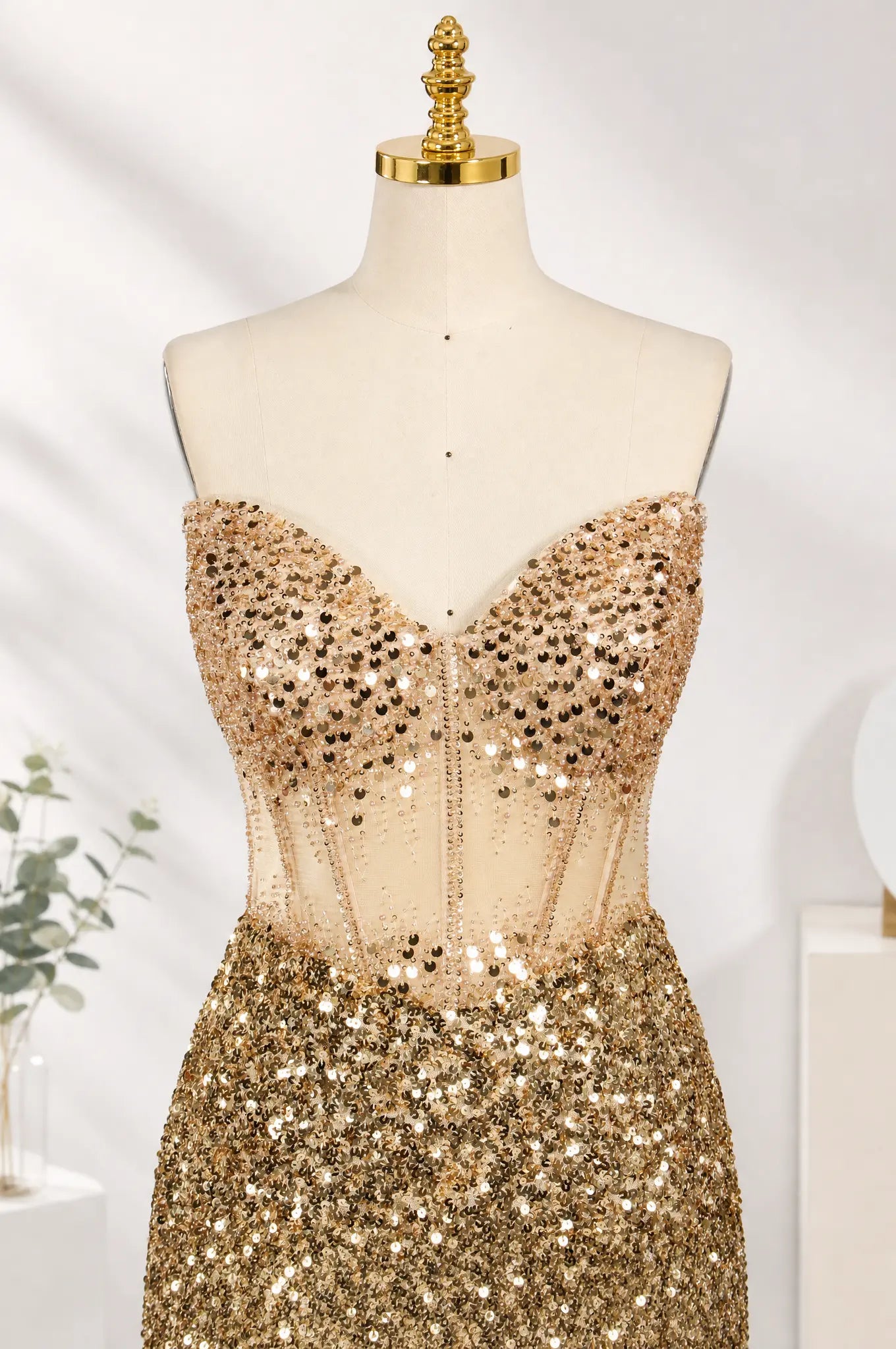 Gold sequined strapless corset mini dress with sweetheart neckline