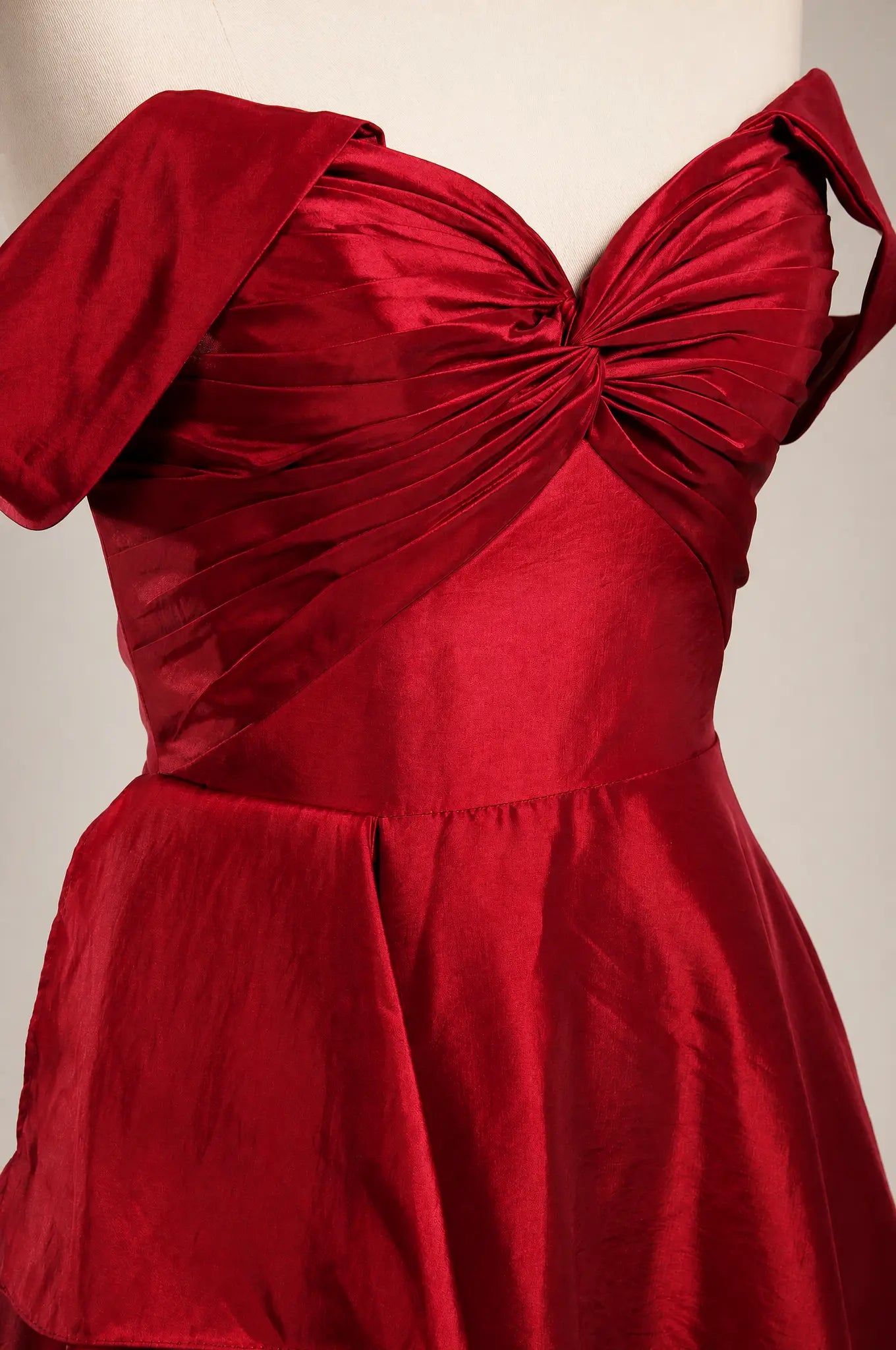 Wine red off-shoulder prom dress with gathered bodice and draped skirt detail
